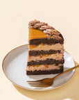 Caramel Vegan Naked Cake with fluffy chocolate sponge layers, vegan caramel frosting, and a rich caramel drizzle, beautifully presented as a dairy-free indulgent treat.