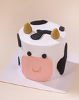 Mini 3-inch custom cake featuring a Moo Moo Cow design, handcrafted for birthdays and celebrations in Malaysia. Designer cake available for delivery.