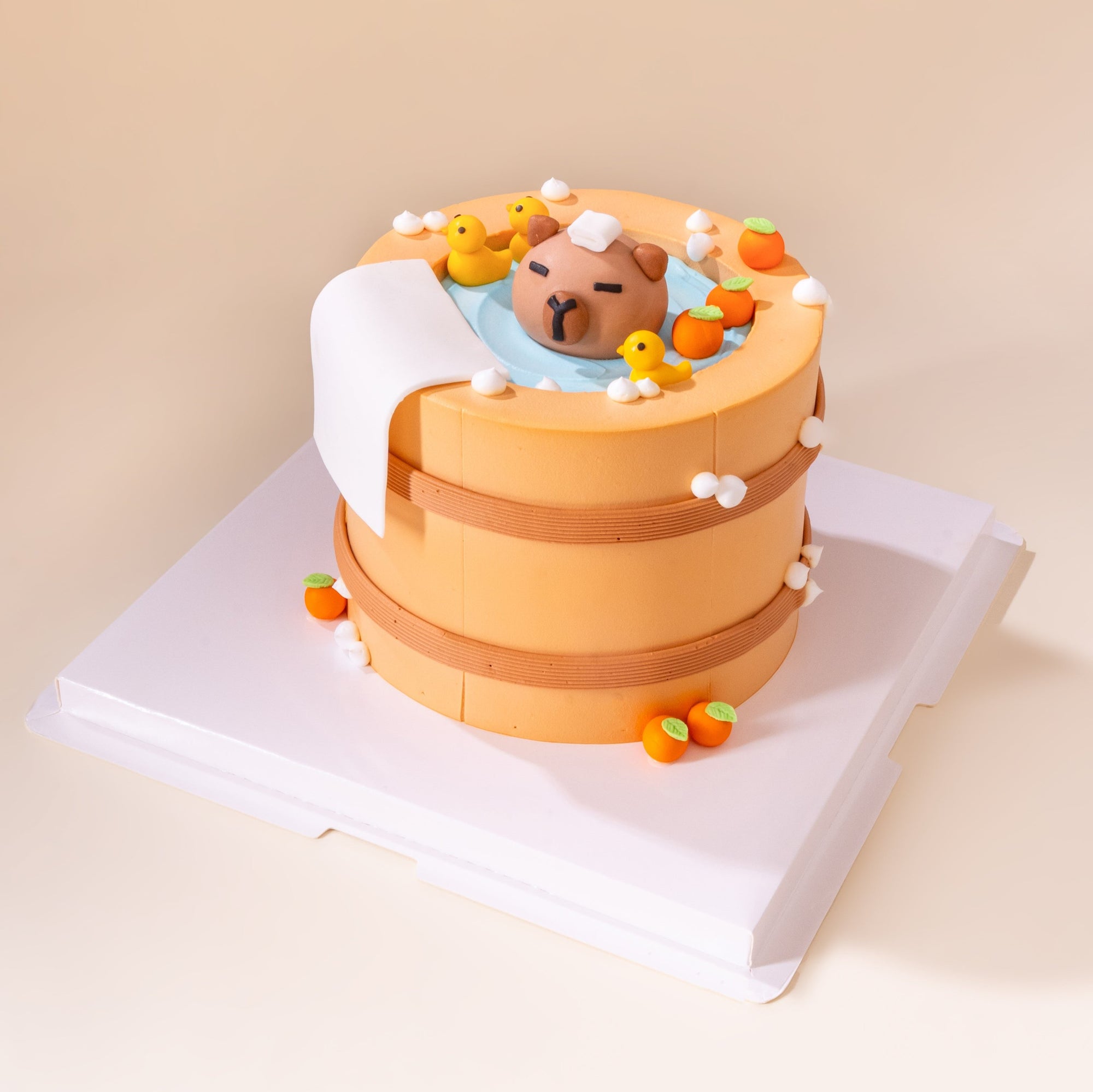 Capybara hot spring custom cake for bespoke celebrations and parties.